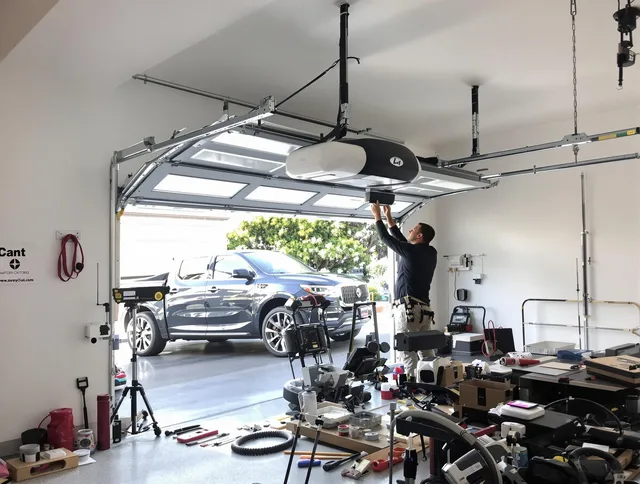 Gardena Garage Door Repair specialist installing smart garage door opener system in Gardena home